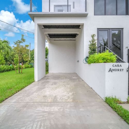 The parking spaces in both units can accommodate up to 2 cars each.