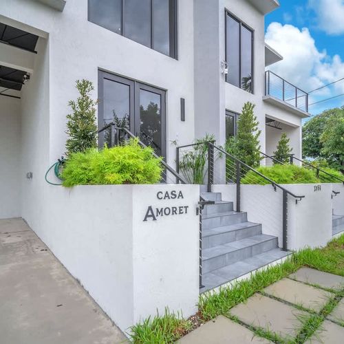 The parking spaces in both units can accommodate up to 2 cars each.