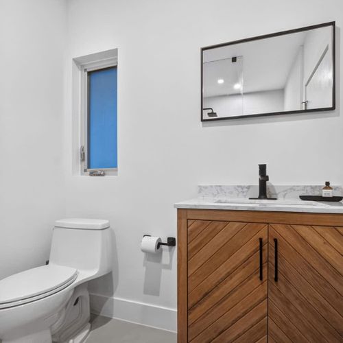 Enjoy a private full bathroom with fresh towels and amenities.
