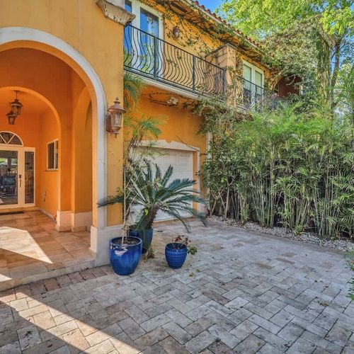 Breathe in the fresh morning air surrounded by lush outdoor greenery.