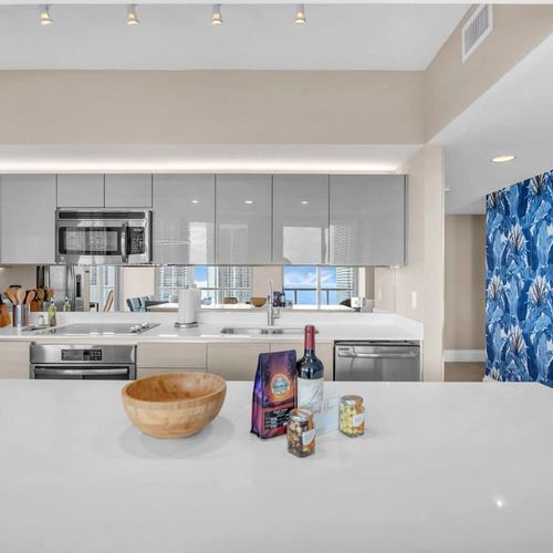 Well-equipped kitchen with modern appliances, expansive counter space, and a generous island ideal for cooking and casual gatherings.