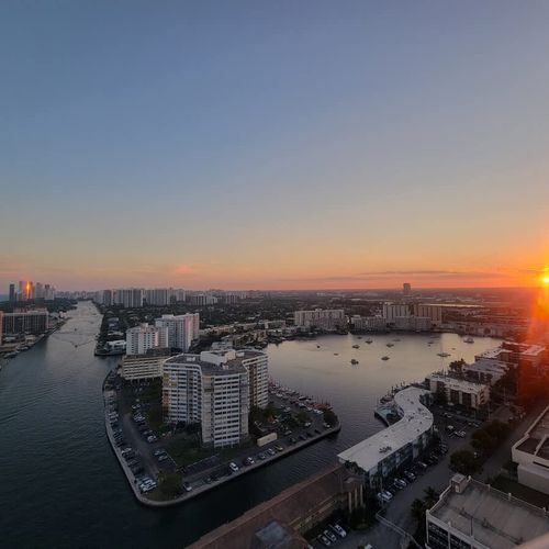 End your day with a breathtaking sunset over the city and calm waterways below.