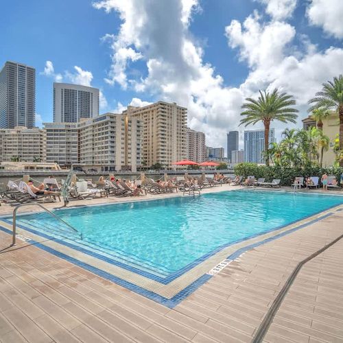 Relax by the first-floor pool with plenty of lounge seating and a welcoming outdoor setting, accessible to guests from 7 AM to 8 PM.