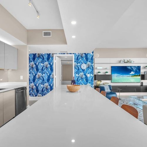 Well-equipped kitchen with modern appliances, expansive counter space, and a generous island ideal for cooking and casual gatherings.