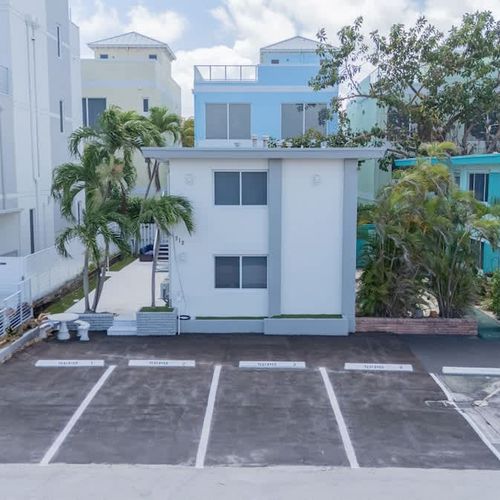 Each unit includes one dedicated on-site parking space for guest convenience.