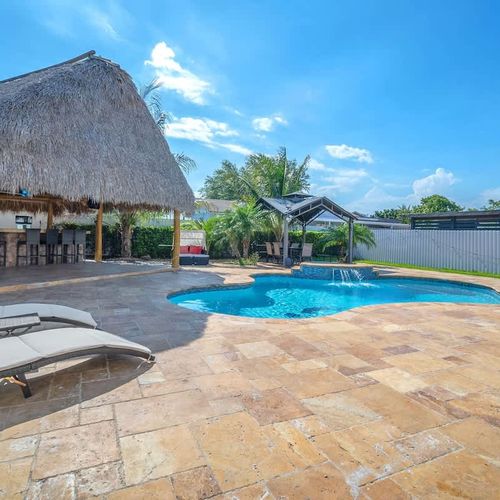 Comfortable lounge chairs by the pool—ideal for soaking up the sun.