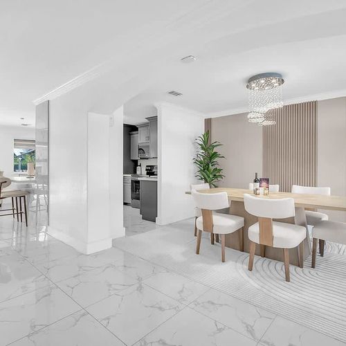 Bright, open dining space conveniently located next to the kitchen, perfect for shared meals and gatherings.