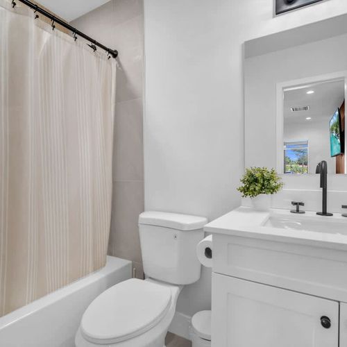 Enjoy a clean, generously sized bathrooms with modern finishes and equipped with all the basics, including towels, toiletries essentials, and a convenient hair dryer.