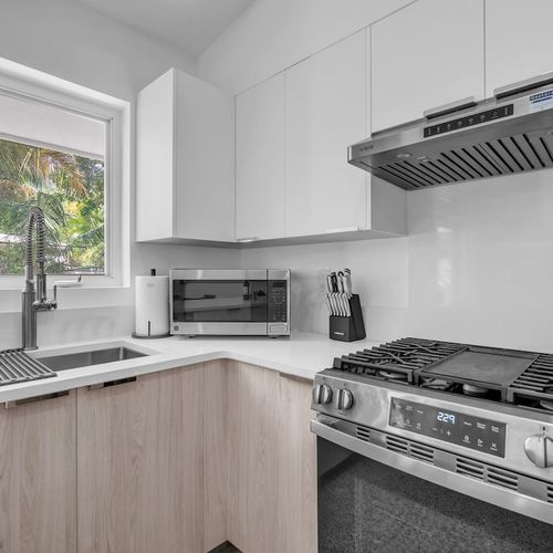 Whip up delicious home-cooked meals anytime; featuring a fully equipped kitchen with basic essentials, generous counter space, and modern appliances for short or long stays.
