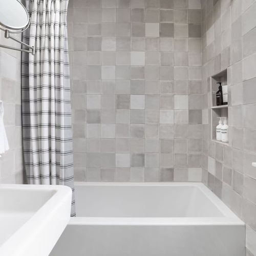Enjoy an invigorating shower or Indulge in ultimate relaxation featuring our luxurious deep soaking tub. Elevate your stay with a touch of spa-like serenity — where every soak becomes a rejuvenating escape. 
— water repellent cotton shower curtain.
