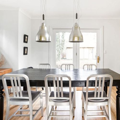 Gather around the table in our spacious dining room, perfect for meals,  conversations or games with family and friends. Seats up to 6 guests comfortably. Assorted board games and card games in the buffet cabinet at left.