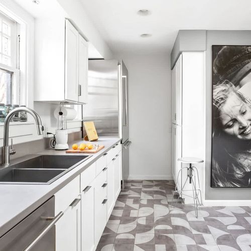 "Everything is the highest quality… bed linens, towels, soaps, kitchenware, etc. Enjoyed having a cappuccino in the morning and a glass of wine in the evening, and a lovely neighborhood to walk through." — Helen
—Refrigerator by Thermador.