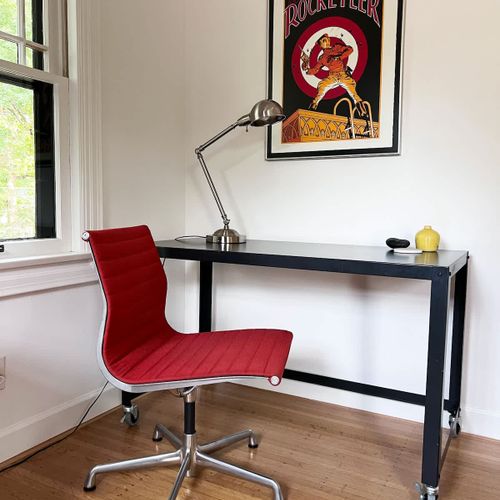 A simple work space to get things done. Eames Aluminum Group Chair for Herman Miller. Super comfortable chair.