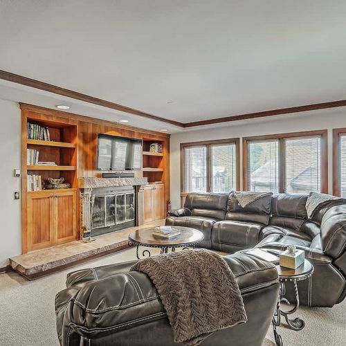 Living area with wood-burning fireplace