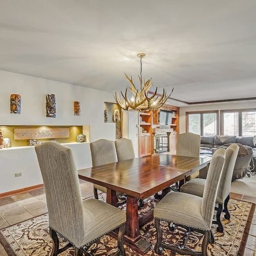 The dining table seats 6