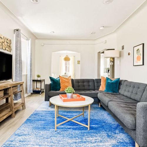 Living area looking into dining area and kitchen