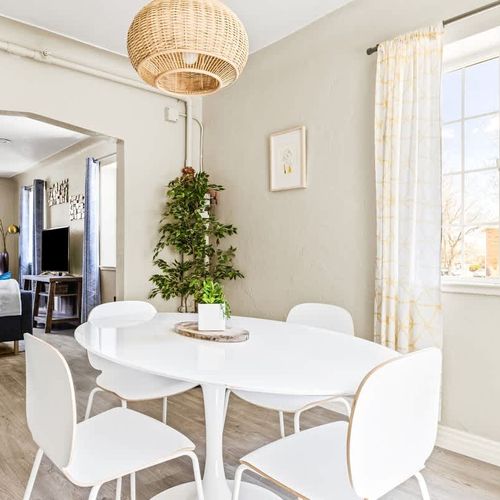 The dining table seats 4