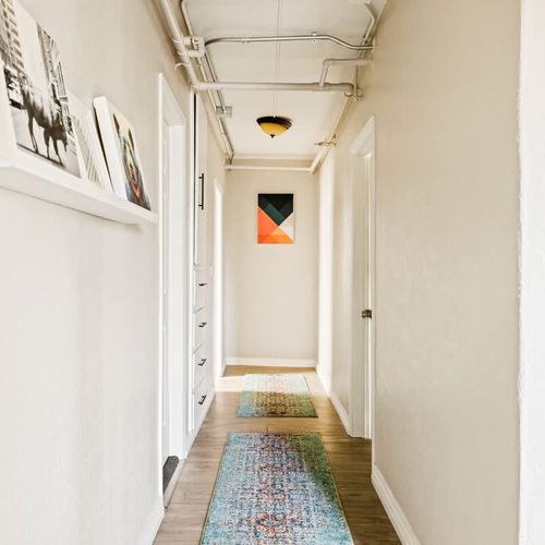 Hallway leading to second bedroom and bathroom
