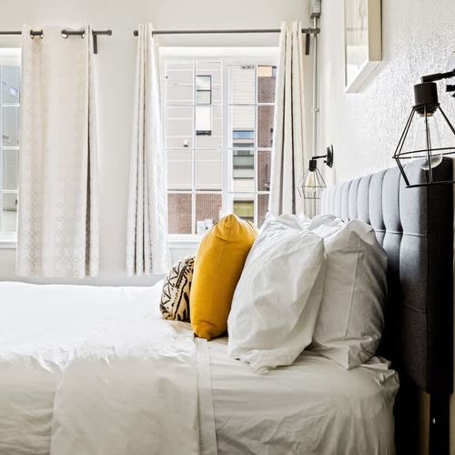 Both bedrooms have window AC units