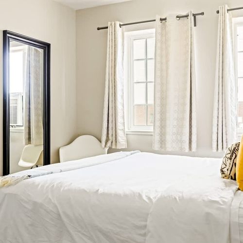 Bedroom 2 has a full length mirror