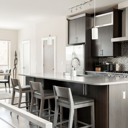 Bar-style seating (The coffee maker is drip only - no Nespresso or Keurig available for use)