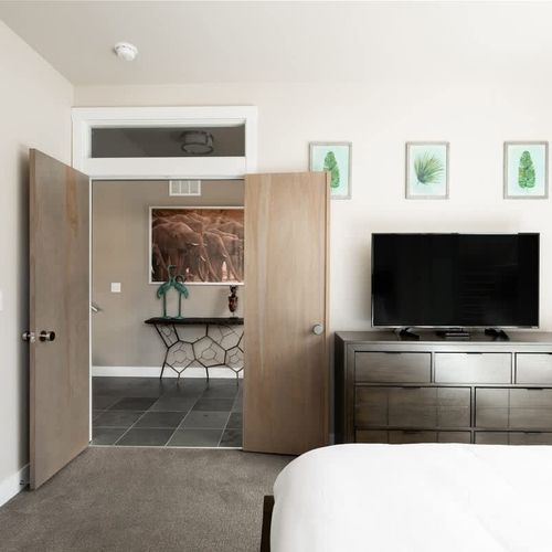 Bedroom 1 with flat screen TV