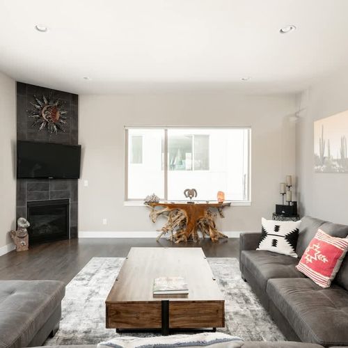 Living area with gas fireplace and flatscreen TV