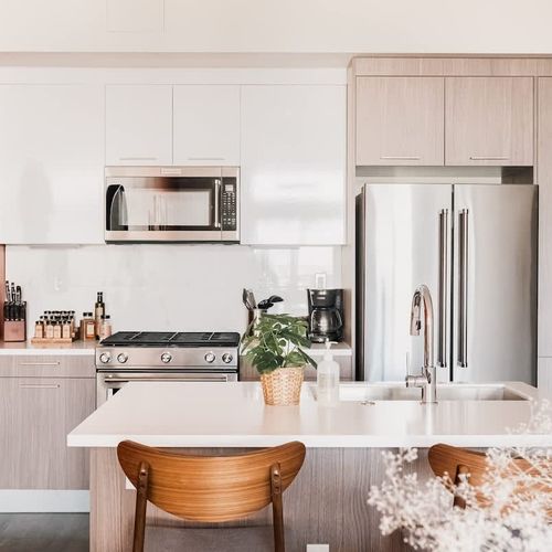 Kitchen with island and bar seating