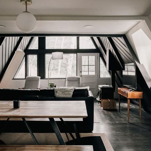 Dining and living areas (the wood-burning stove is decorative only and does not operate)