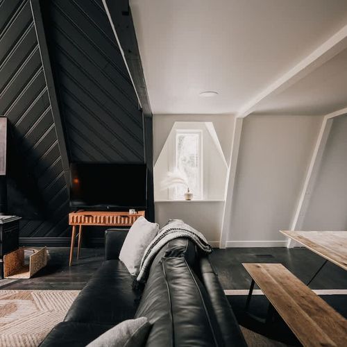 Flatscreen TV in the living room (the wood-burning stove is decorative only and does not operate)