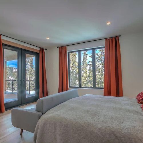 Primary bedroom with deck/hot tub access