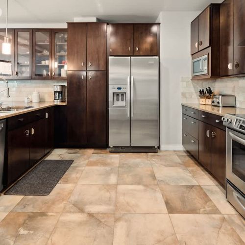 The kitchen has all appliances and utensils needed to cook a great meal.