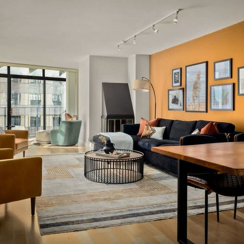 Living area and dining space (The fireplace is non-operational)