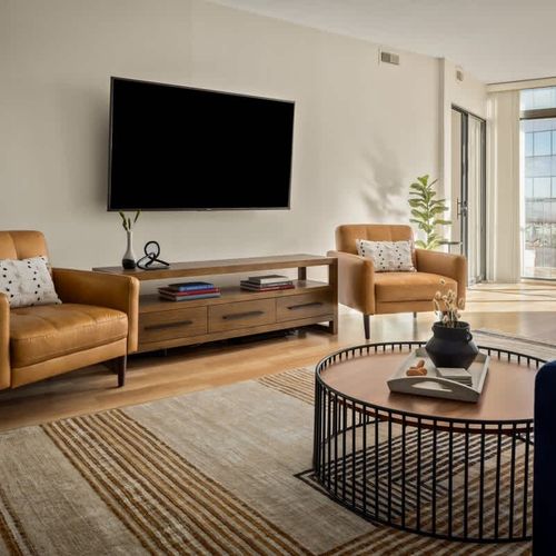 Additional living area seating and TV