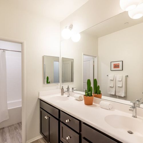 Full bathroom 3 with dual vanities