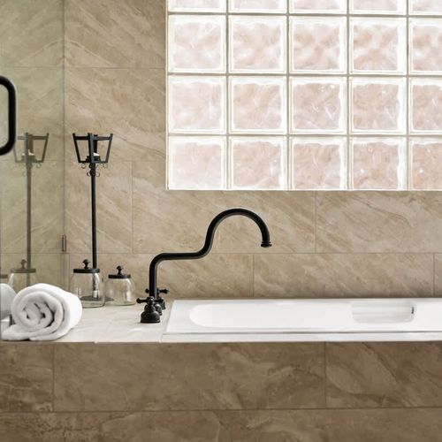 Primary bedroom's full ensuite bathroom with soaking tub