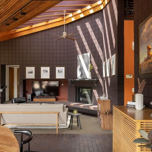 Large open-concept living area with skylights *Gas fireplace not available for use*