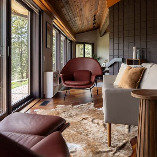 Additional couch and chairs in main living area