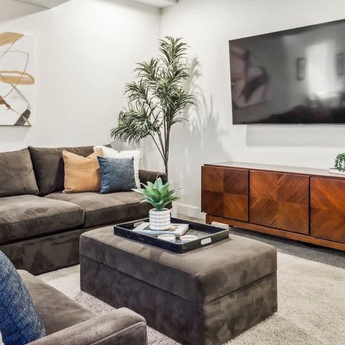 The basement living area has another TV