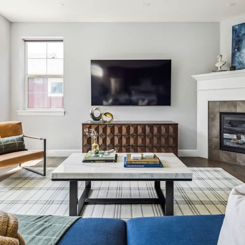 Living area with TV and gas fireplace