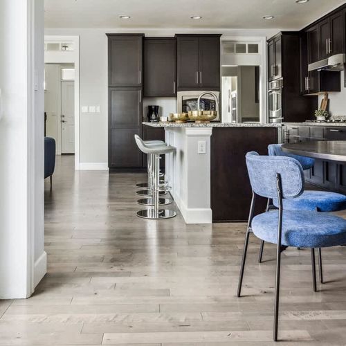 Looking from the mud room into the dining area and kitchen