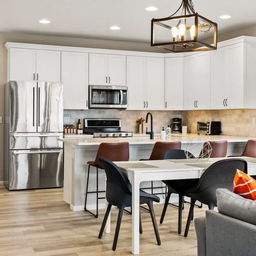 Main level living and dining areas with kitchen