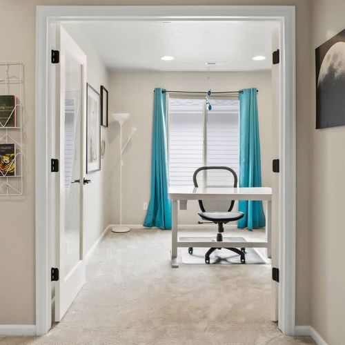 Office with desk and chair