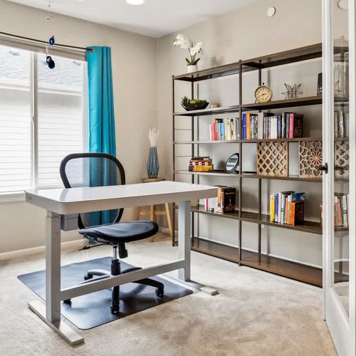 Office with a 'take a book, leave a book library' for your use