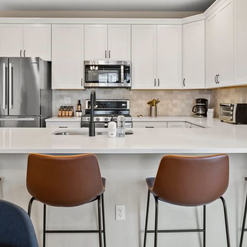 Bar-style seating at the kitchen counter