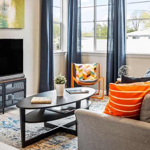 Main level living area with TV