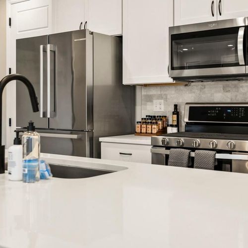 Kitchen with all stainless steel appliances