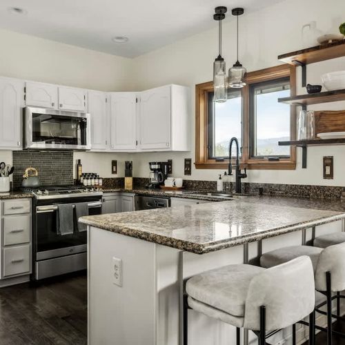 Kitchen with all stainless steel appliances