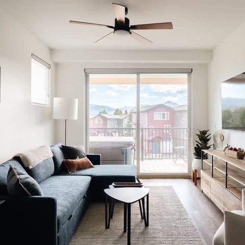 Living area with full-size sleeper sofa