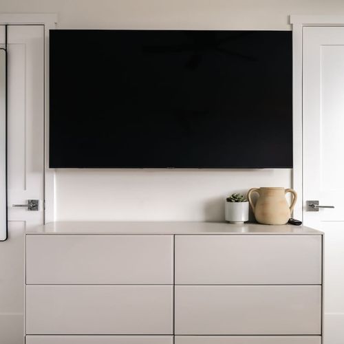 Primary bedroom with flatscreen TV